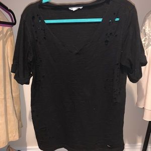 Black v-neck T-shirt with distressed look.